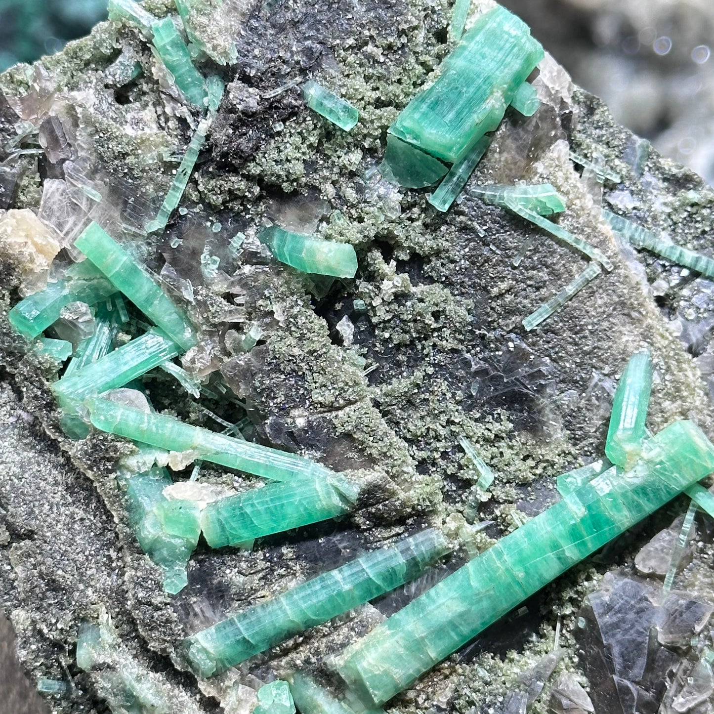 Emerald with smoky quartz specimen