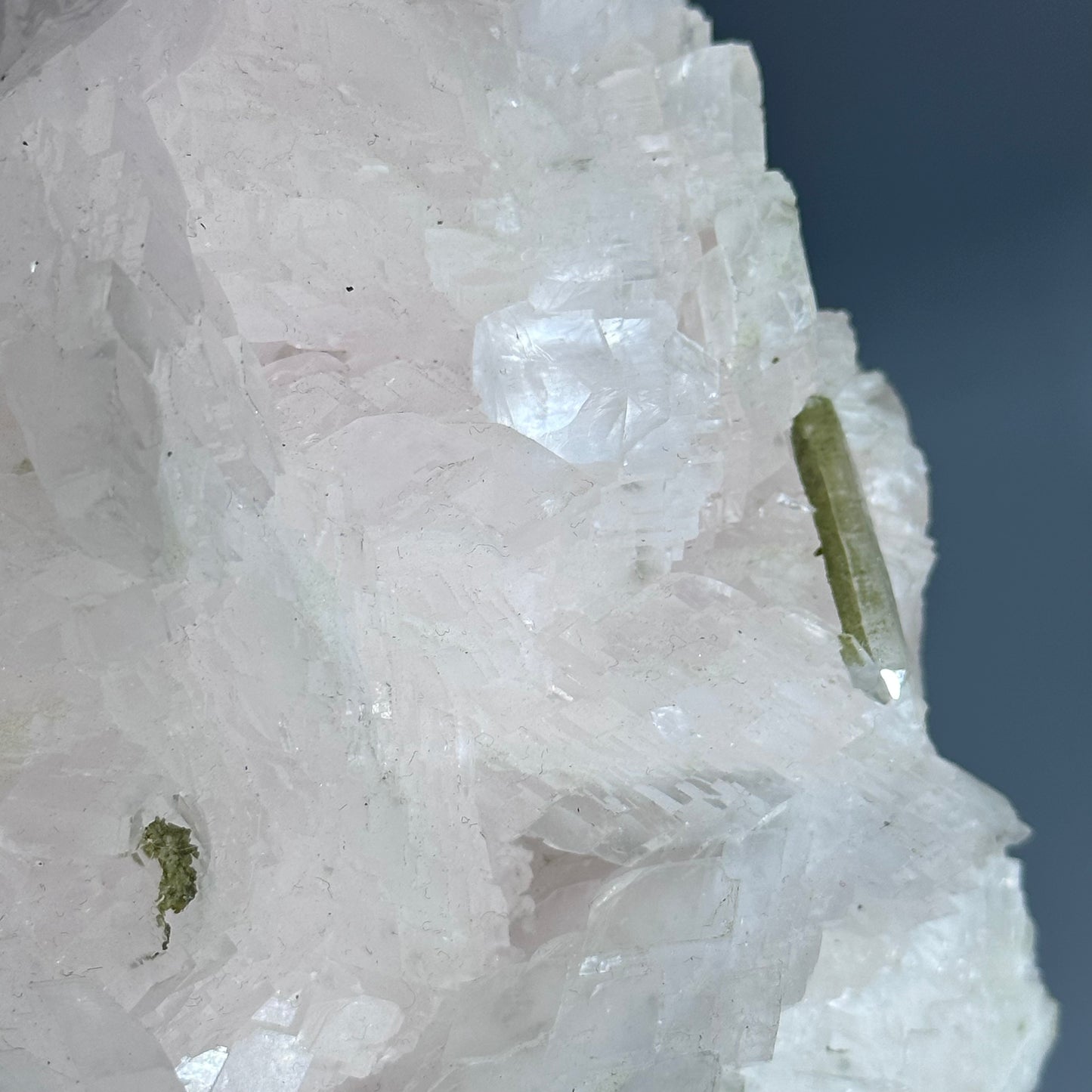 pink calcite with green tourmaline specimen
