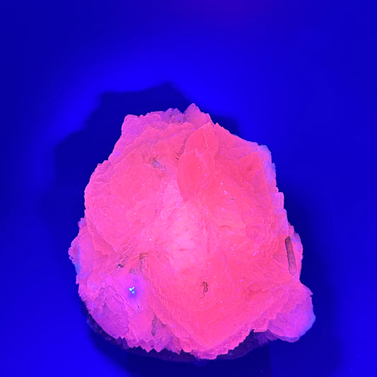 pink calcite with green tourmaline specimen